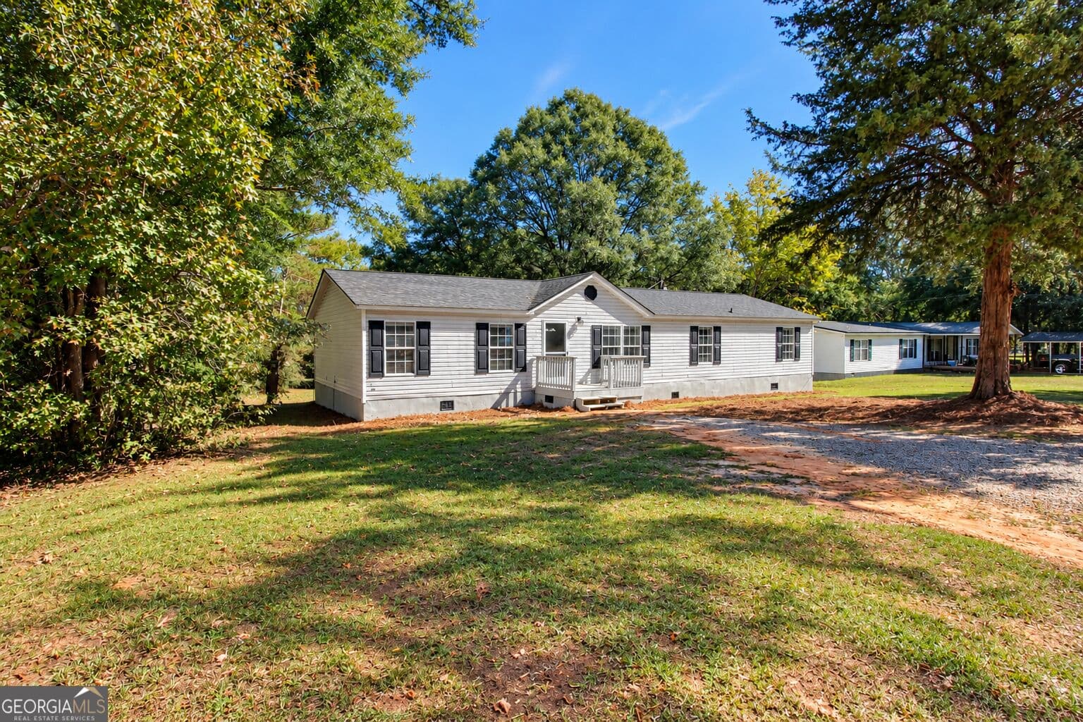4 bedroom, 2 bathroom, 1,488 sq ft single family residence for sale at 222 Hogan Industrial Boulevard, Eatonton, GA 31024 — photo 2