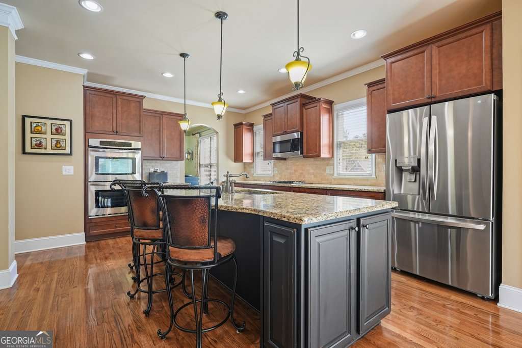 5 bedroom, 4 bathroom, 3,552 sq ft single family residence for sale at 302 Grant Court, Canton, GA 30114 — photo 6