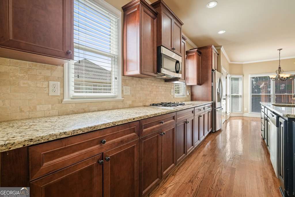 5 bedroom, 4 bathroom, 3,552 sq ft single family residence for sale at 302 Grant Court, Canton, GA 30114 — photo 5