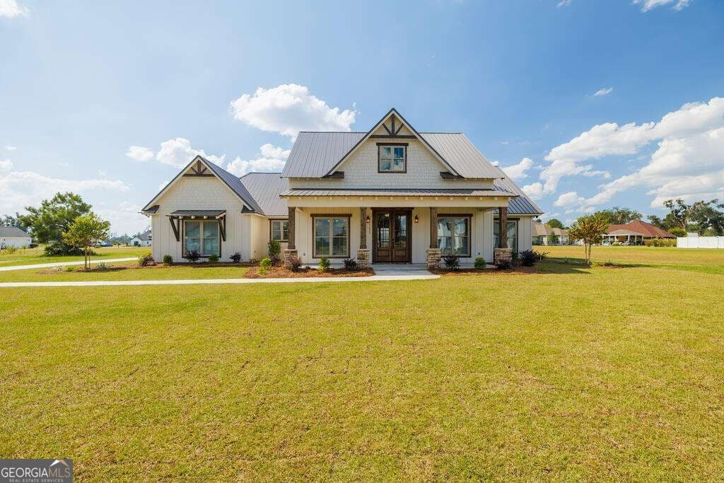 4 bedroom, 3 bathroom, 2,323 sq ft single family residence for sale at 5622 Buck Run Road, Lake Park, GA 31636 — photo 2