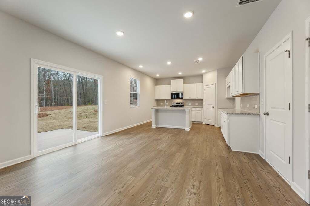 5 bedroom, 4 bathroom, 2,343 sq ft single family residence for sale at 8031 Dickens Drive, Fairburn, GA 30213 — photo 7
