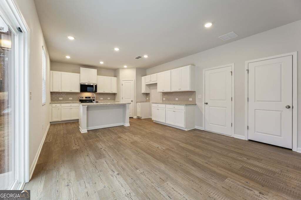 5 bedroom, 4 bathroom, 2,343 sq ft single family residence for sale at 8031 Dickens Drive, Fairburn, GA 30213 — photo 9