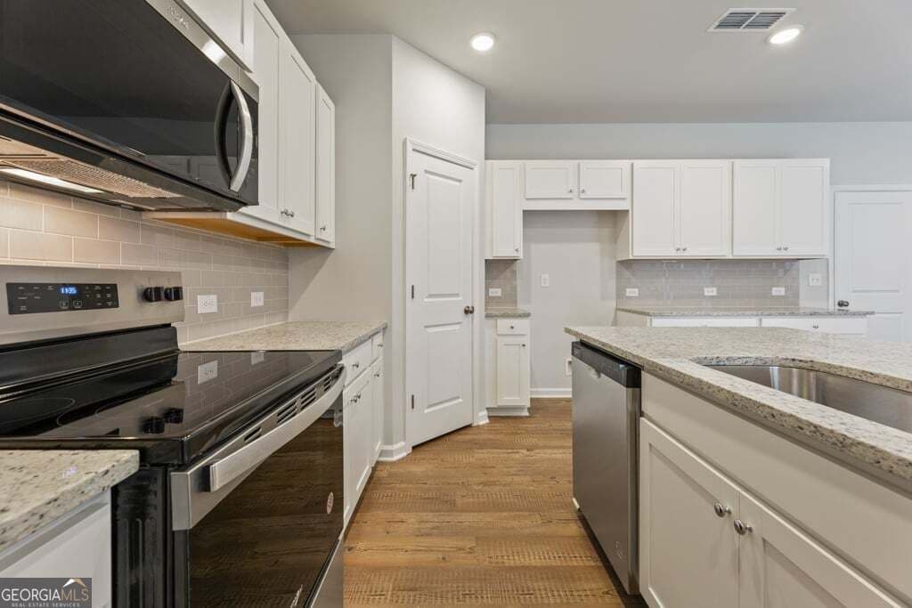 5 bedroom, 4 bathroom, 2,343 sq ft single family residence for sale at 8031 Dickens Drive, Fairburn, GA 30213 — photo 10