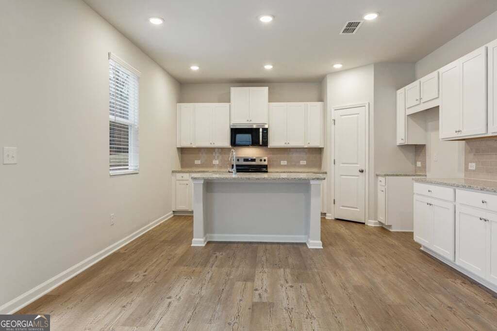 5 bedroom, 4 bathroom, 2,343 sq ft single family residence for sale at 8031 Dickens Drive, Fairburn, GA 30213 — photo 8