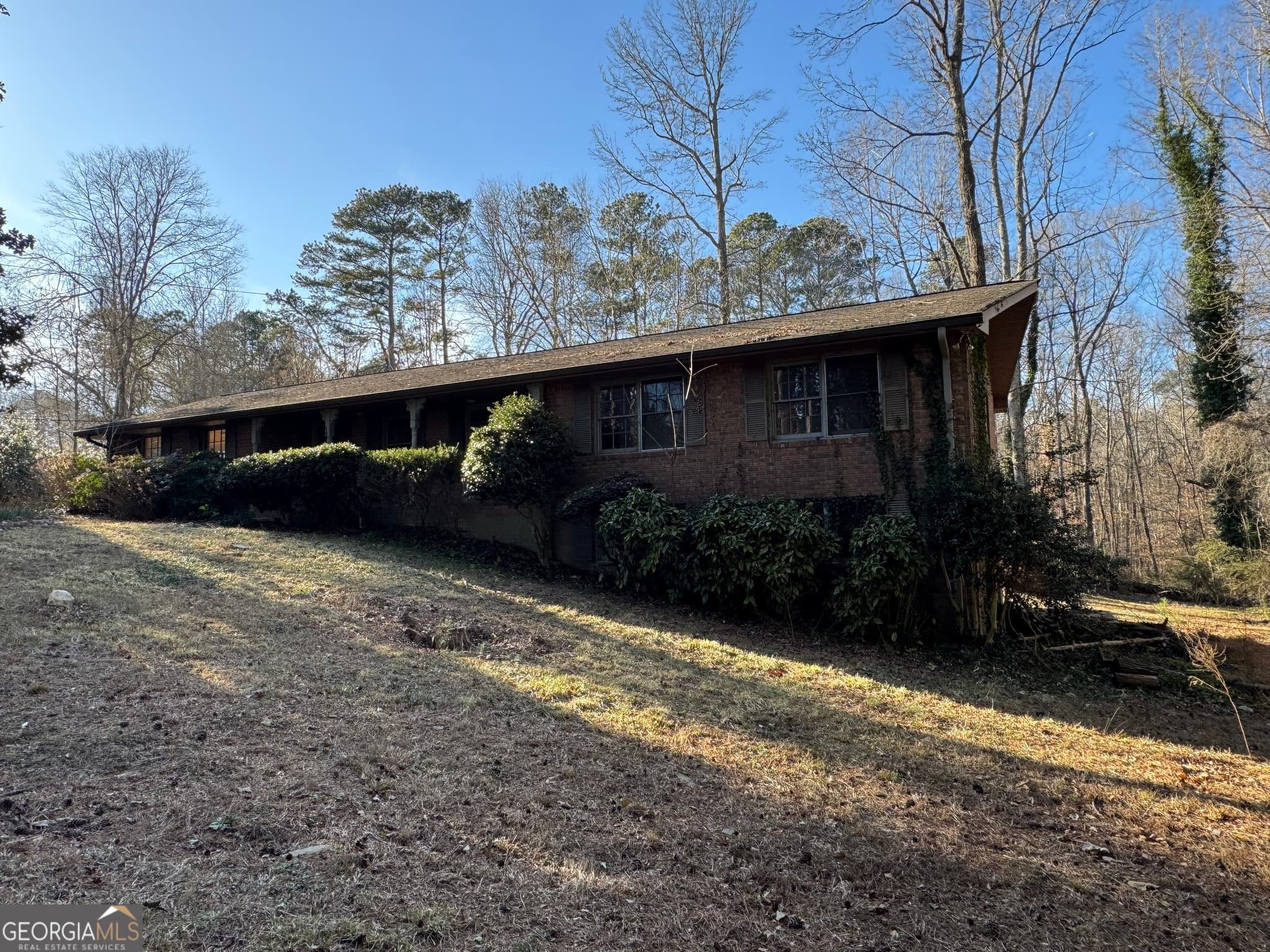 3 bedroom, 2.5 bathroom, 1,296 sq ft single family residence for sale at 3955 Demooney Road, Atlanta, GA 30349
