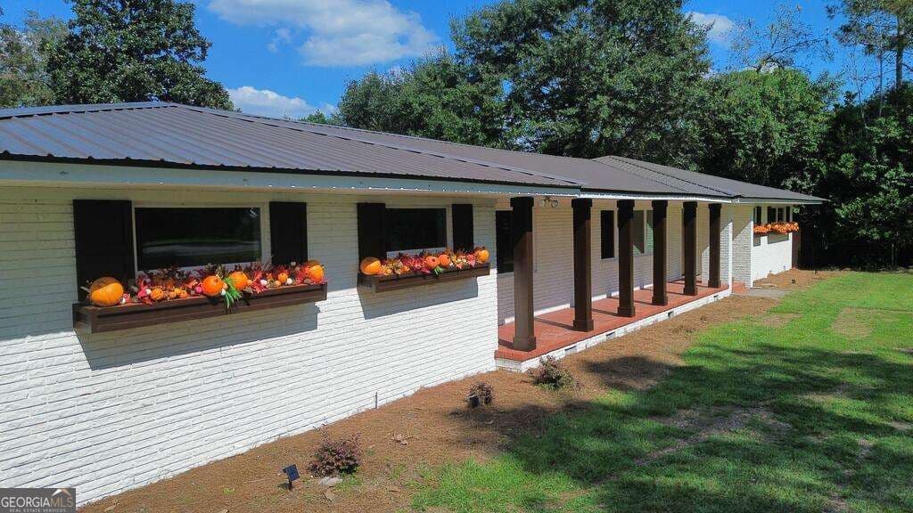 4 bedroom, 3.5 bathroom, 2,968 sq ft single family residence for sale at 911 W Roanoke Drive Extension, Fitzgerald, GA 31750 — photo 2