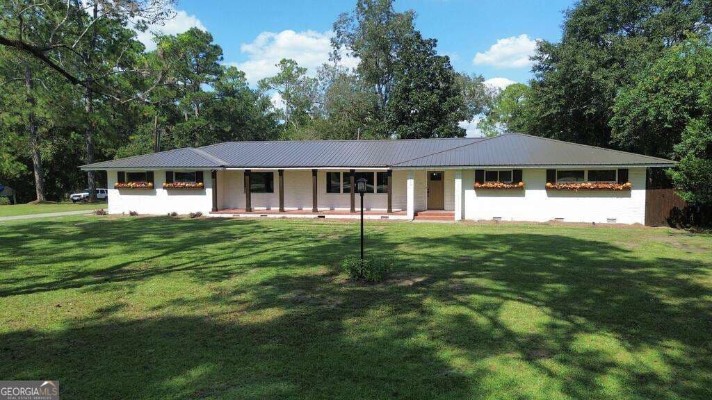 4 bedroom, 3.5 bathroom, 2,968 sq ft single family residence for sale at 911 W Roanoke Drive Extension, Fitzgerald, GA 31750 — photo 3