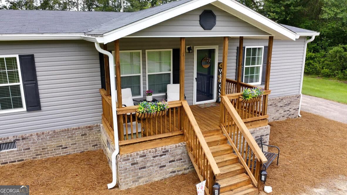 4 bedroom, 2 bathroom, 2,432 sq ft manufactured home,single family residence under contract at 9400 Ga Highway 24, Statesboro, GA 30461 — photo 2