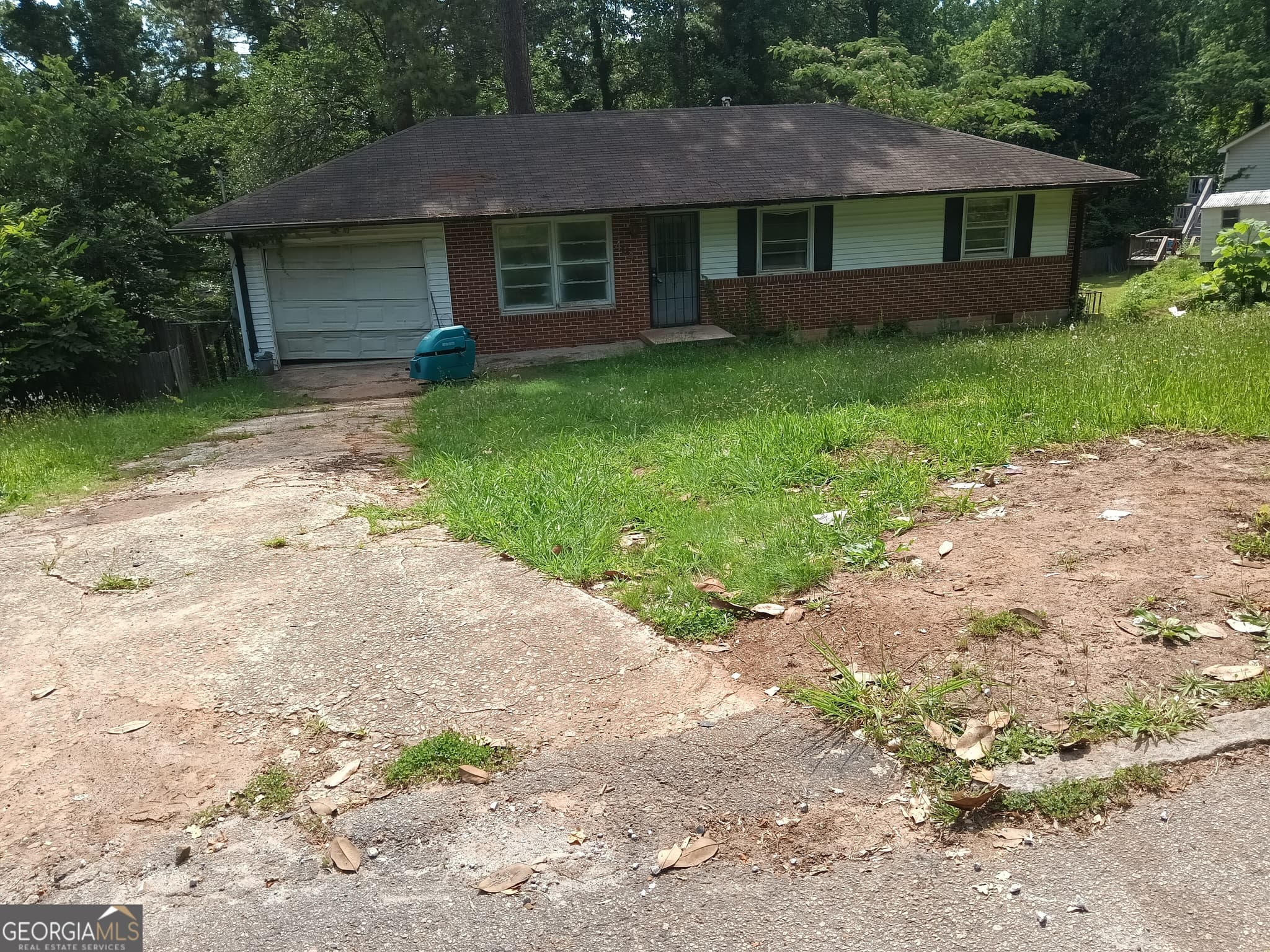 3 bedroom, 1 bathroom, 2,100 sq ft single family residence for sale at 4842 Ridgewood Drive, Forest Park, GA 30297 — photo 1 of 16