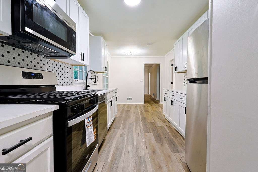 3 bedroom, 2.5 bathroom, 2,348 sq ft single family residence for sale at 2016 Gibralter Way, Conyers, GA 30012 — photo 5