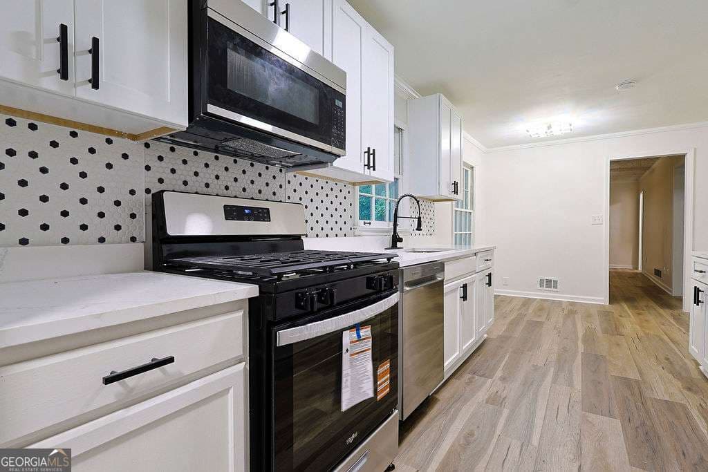3 bedroom, 2.5 bathroom, 2,348 sq ft single family residence for sale at 2016 Gibralter Way, Conyers, GA 30012 — photo 4