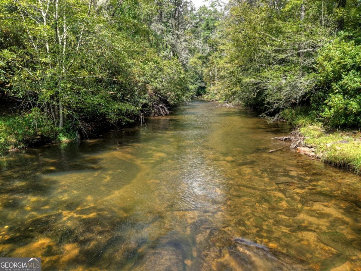 5 bedroom, 3 bathroom, 3,996 sq ft cabin,single family residence for sale at 324 Cooper Creek Drive, Suches, GA 30572 — photo 6