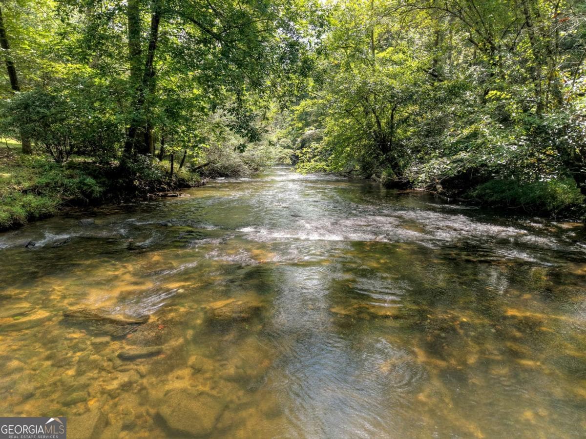 5 bedroom, 3 bathroom, 3,996 sq ft cabin,single family residence for sale at 324 Cooper Creek Drive, Suches, GA 30572 — photo 7