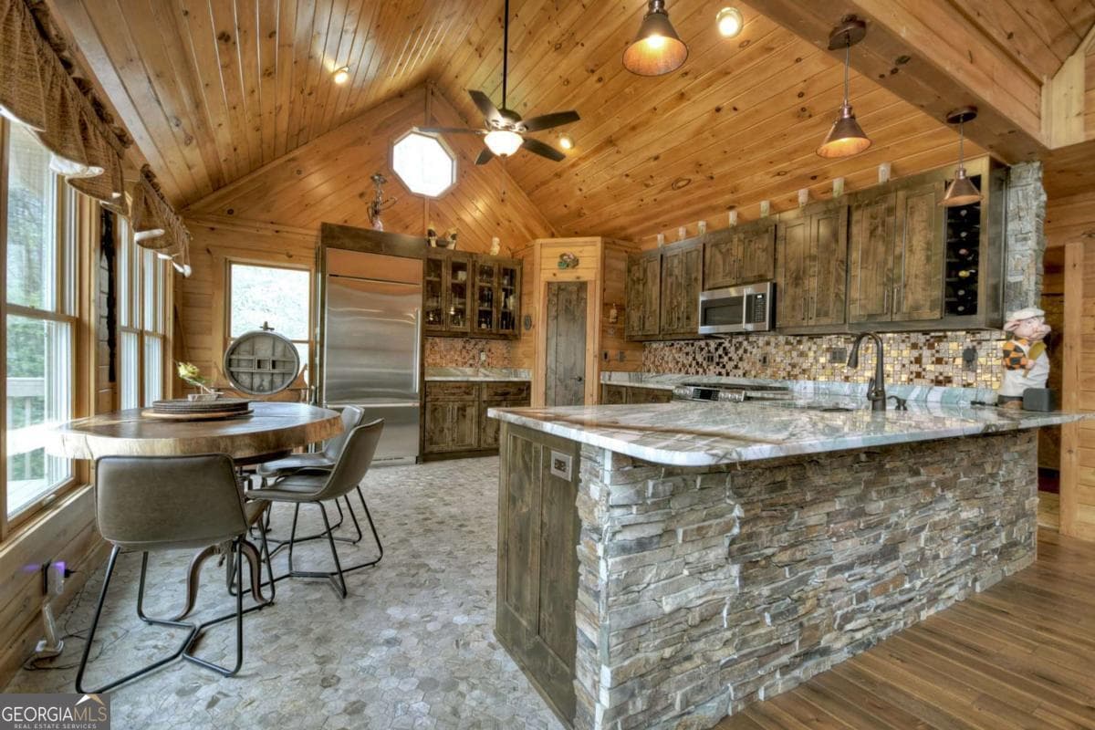 5 bedroom, 3 bathroom, 3,996 sq ft cabin,single family residence for sale at 324 Cooper Creek Drive, Suches, GA 30572 — photo 4
