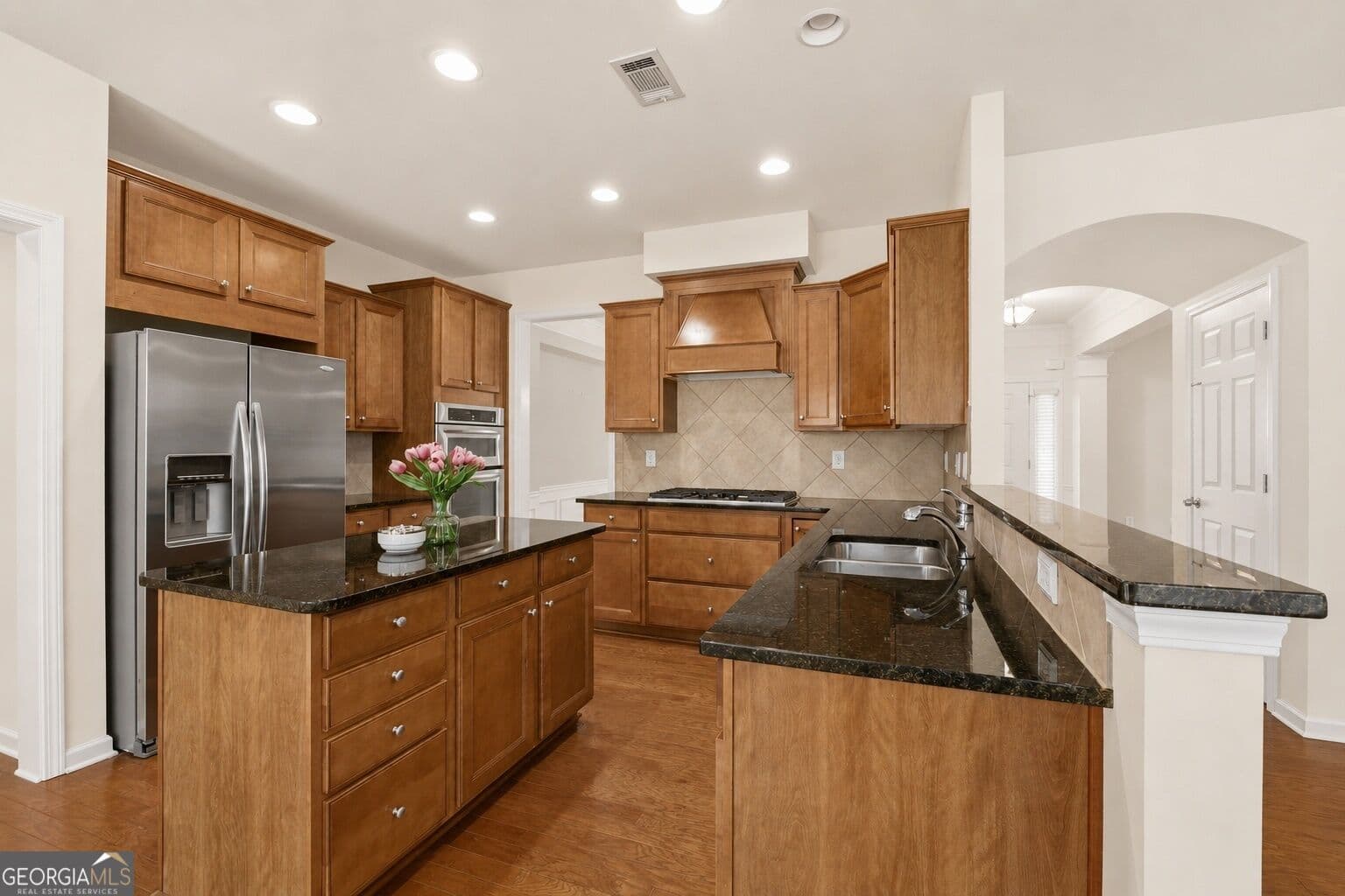 6 bedroom, 5 bathroom, 4,488 sq ft single family residence for sale at 4385 Colchester Creek Drive, Cumming, GA 30040 — photo 6
