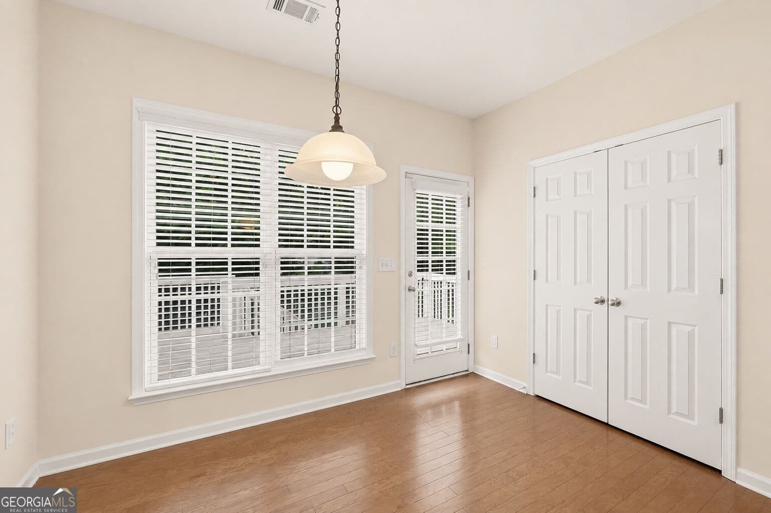 6 bedroom, 5 bathroom, 4,488 sq ft single family residence for sale at 4385 Colchester Creek Drive, Cumming, GA 30040 — photo 8