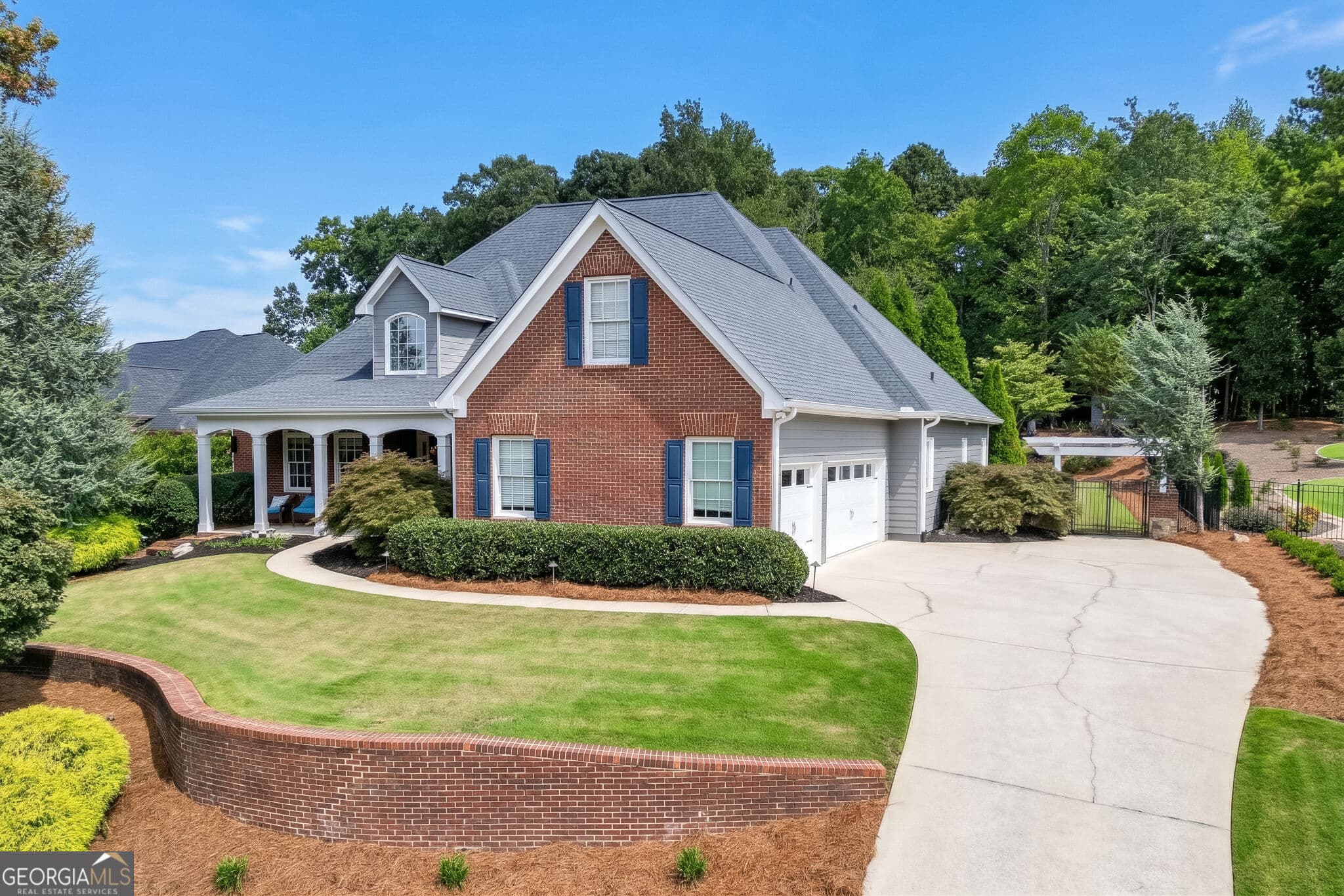 5 bedroom, 5 bathroom, 6,500 sq ft single family residence for sale at 2638 White Rock Drive, Buford, GA 30519 — photo 2