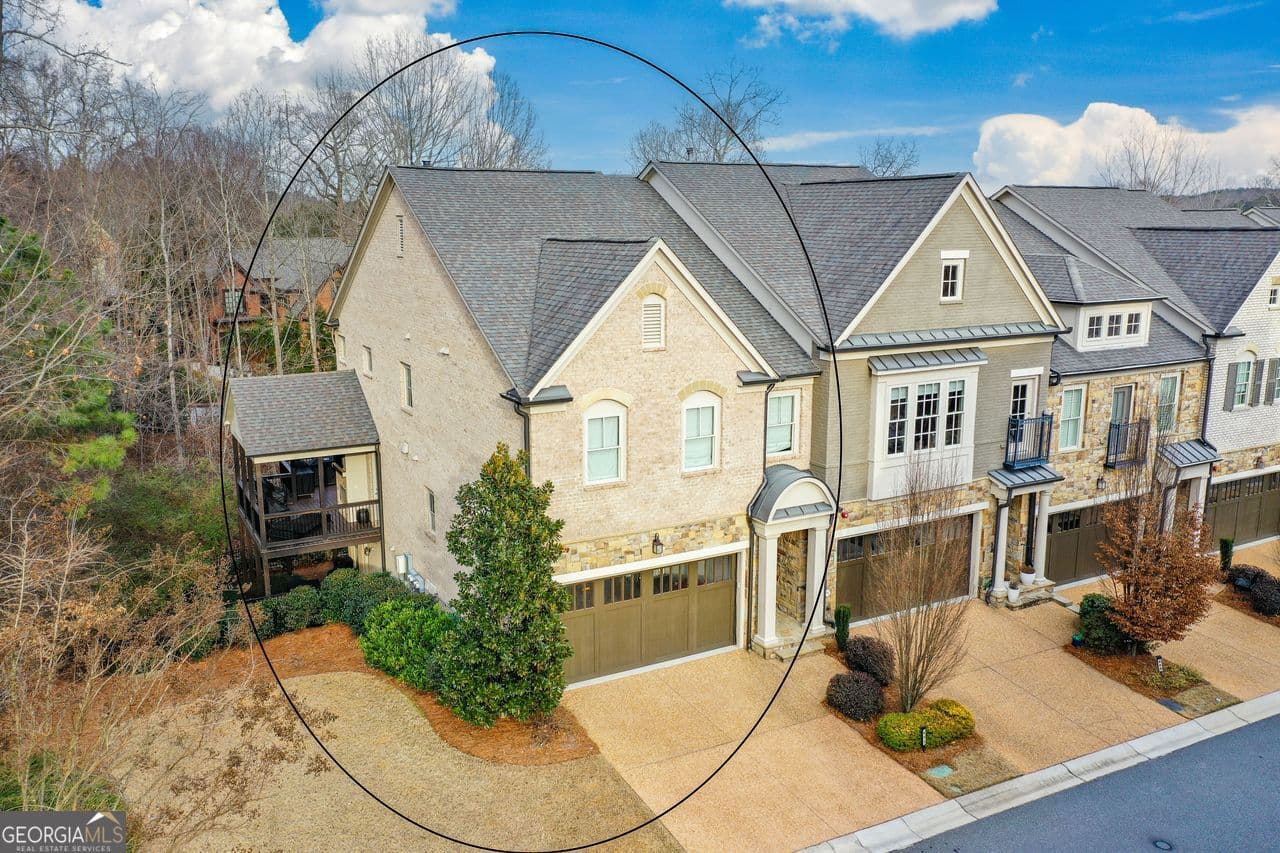 3 bedroom, 3.5 bathroom, 3,306 sq ft townhouse for sale at 601 Abbington River Lane, Atlanta, GA 30339