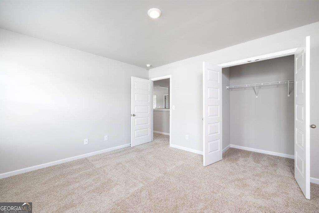 4 bedroom, 3 bathroom single family residence for sale at 1180 Trident Maple Chase, Lawrenceville, GA 30045 — photo 9