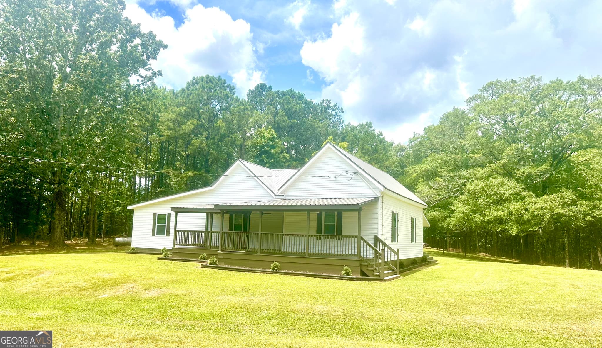 4 bedroom, 2 bathroom, 2,202 sq ft single family residence for sale at 1966 Owens Road, Woodbury, GA 30293 — photo 2