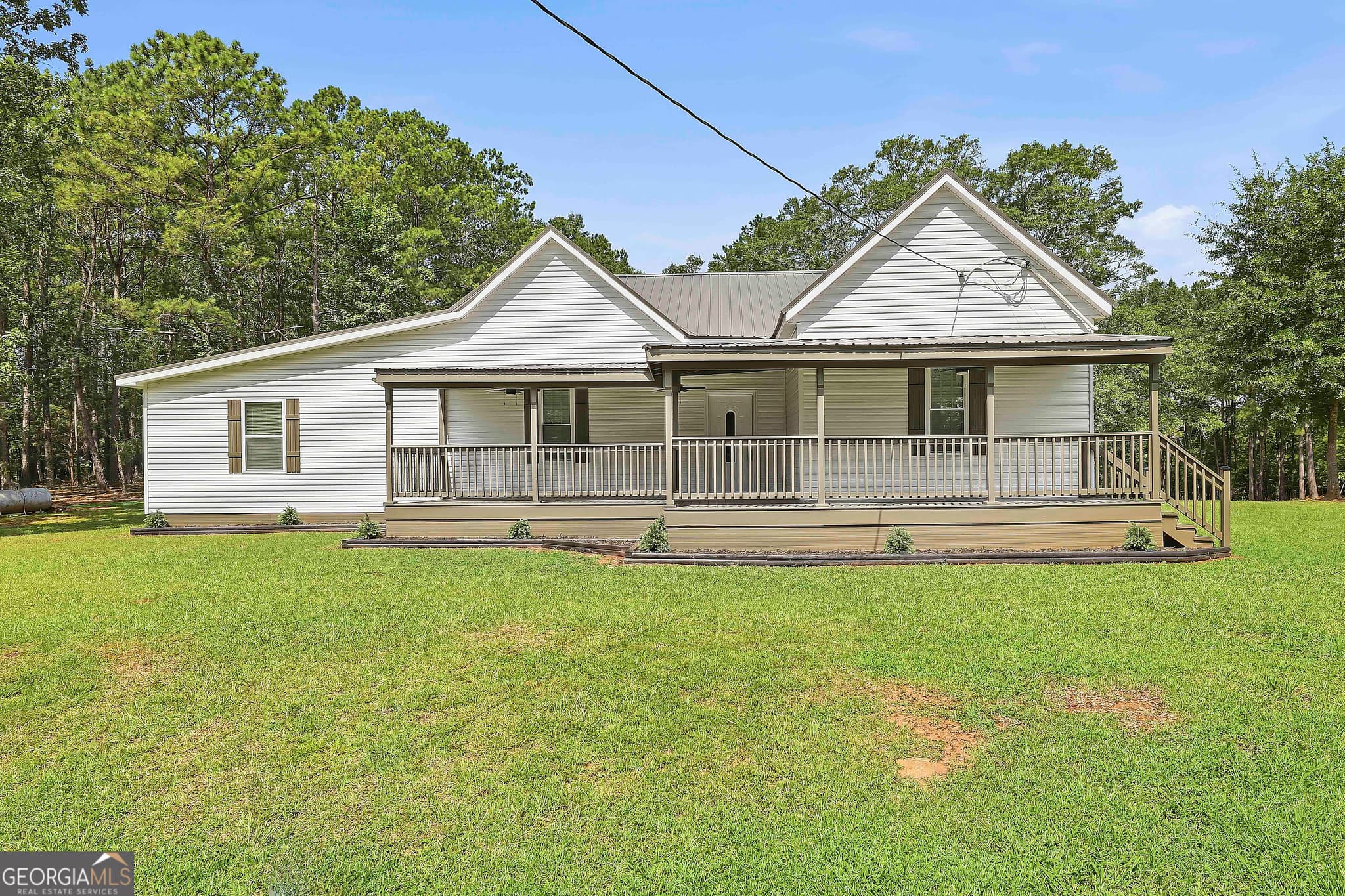 4 bedroom, 2 bathroom, 2,202 sq ft single family residence for sale at 1966 Owens Road, Woodbury, GA 30293