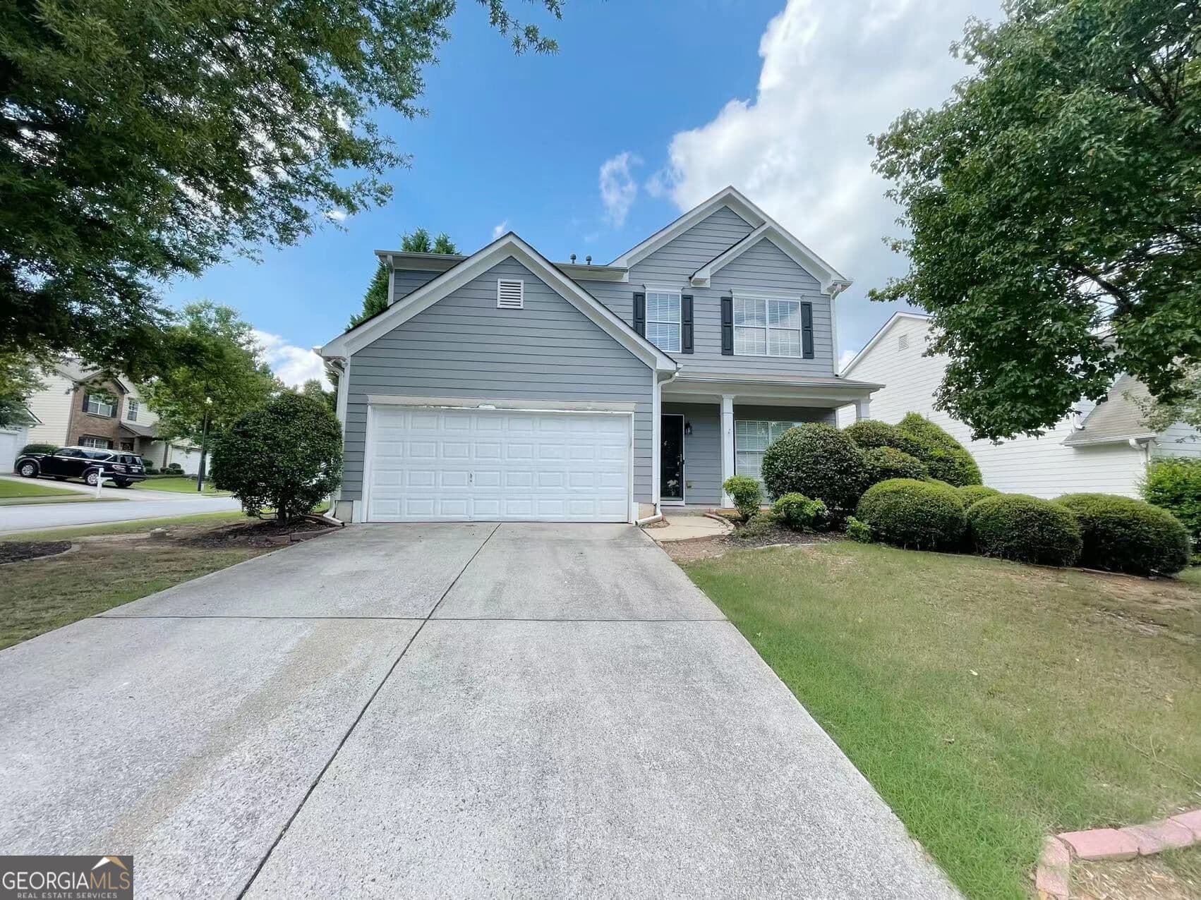 4 bedroom, 2.5 bathroom, 2,201 sq ft single family residence for rent at 401 Norton Crossing, Woodstock, GA 30188 for $2,450 a month — photo 1 of 21