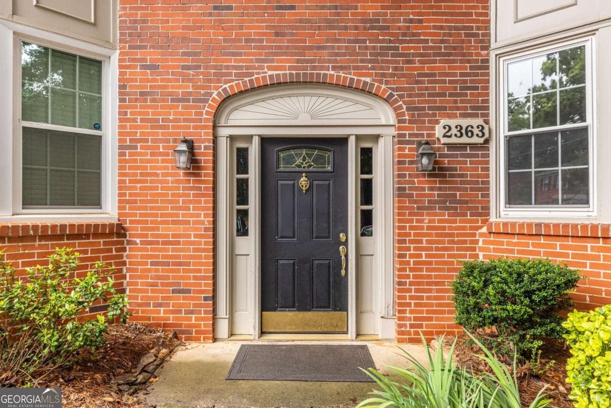 3 bedroom, 2 bathroom, 1,452 sq ft condominium for sale at 2363 Henderson Mill Road 7, Atlanta, GA 30345 — photo 1 of 24