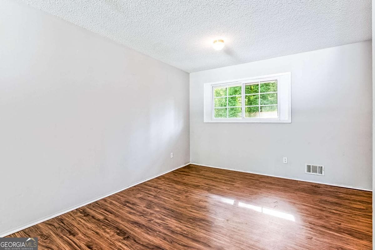 5 bedroom, 2 bathroom, 2,106 sq ft single family residence for sale at 5954 Baywood Lane, Riverdale, GA 30296 — photo 3