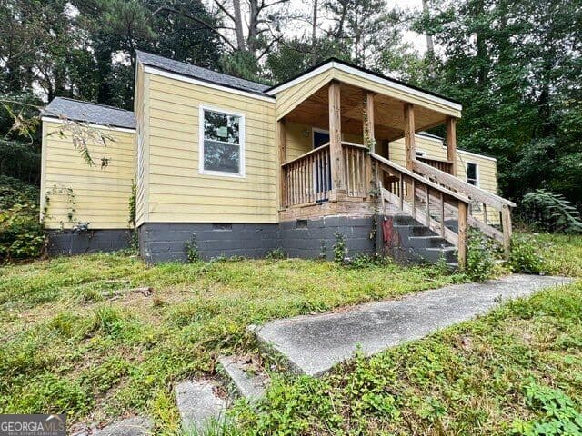 3 bedroom, 2 bathroom, 1,134 sq ft single family residence for sale at 451 Collier Ridge Drive, Atlanta, GA 30318 — photo 2