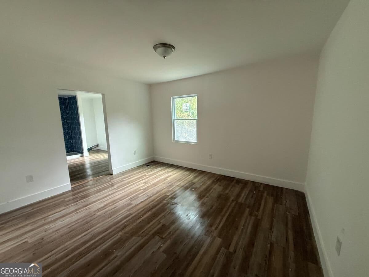 3 bedroom, 2 bathroom, 1,134 sq ft single family residence for sale at 451 Collier Ridge Drive, Atlanta, GA 30318 — photo 6