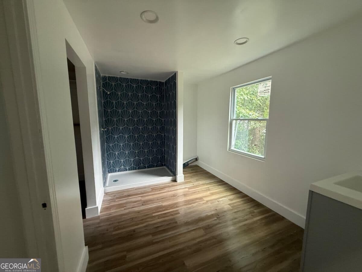 3 bedroom, 2 bathroom, 1,134 sq ft single family residence for sale at 451 Collier Ridge Drive, Atlanta, GA 30318 — photo 7