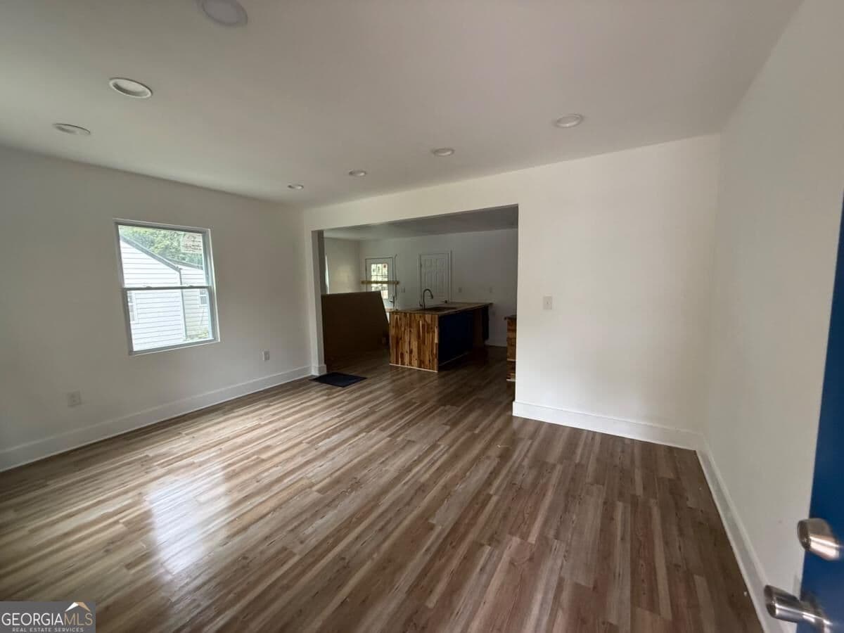 3 bedroom, 2 bathroom, 1,134 sq ft single family residence for sale at 451 Collier Ridge Drive, Atlanta, GA 30318 — photo 3