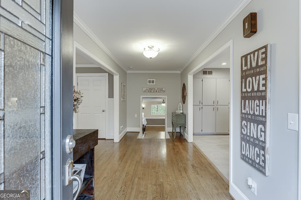 3 bedroom, 3 bathroom, 3,971 sq ft single family residence for sale at 5984 Dolvin Lane, Buford, GA 30518 — photo 8