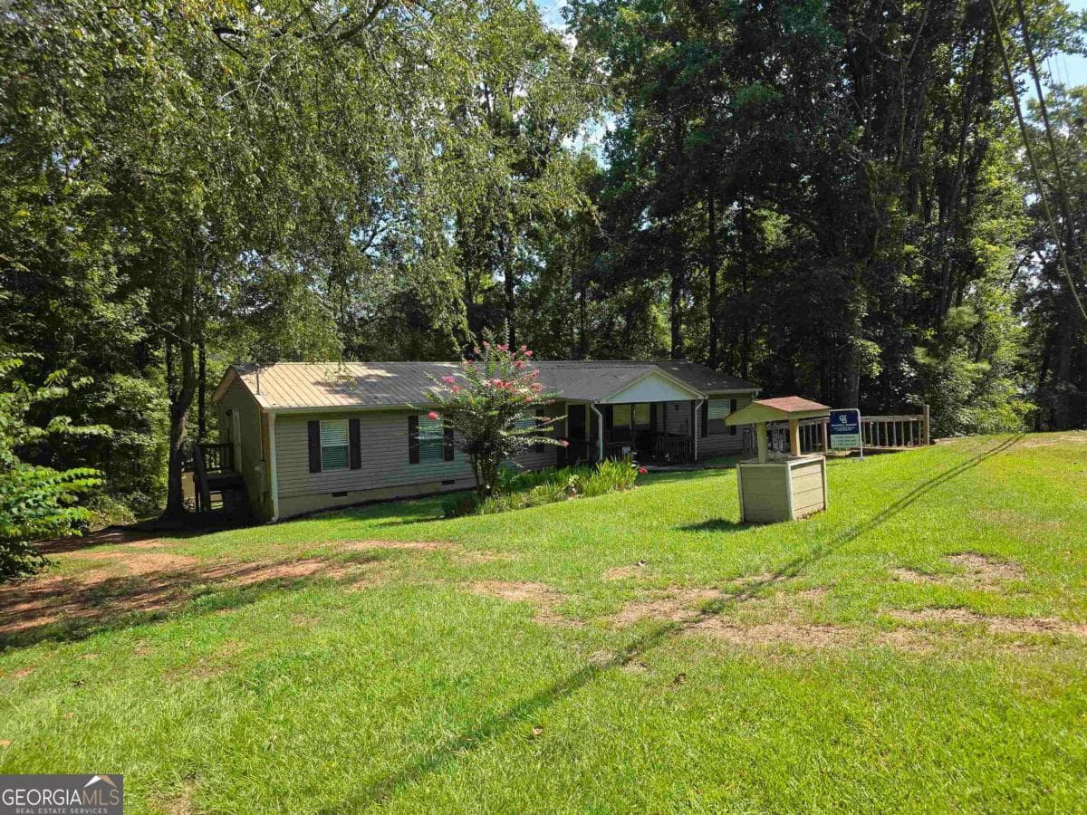 4 bedroom, 2 bathroom, 1,560 sq ft manufactured home,single family residence sold at 331 Twilight Shores Road, Eatonton, GA 31024