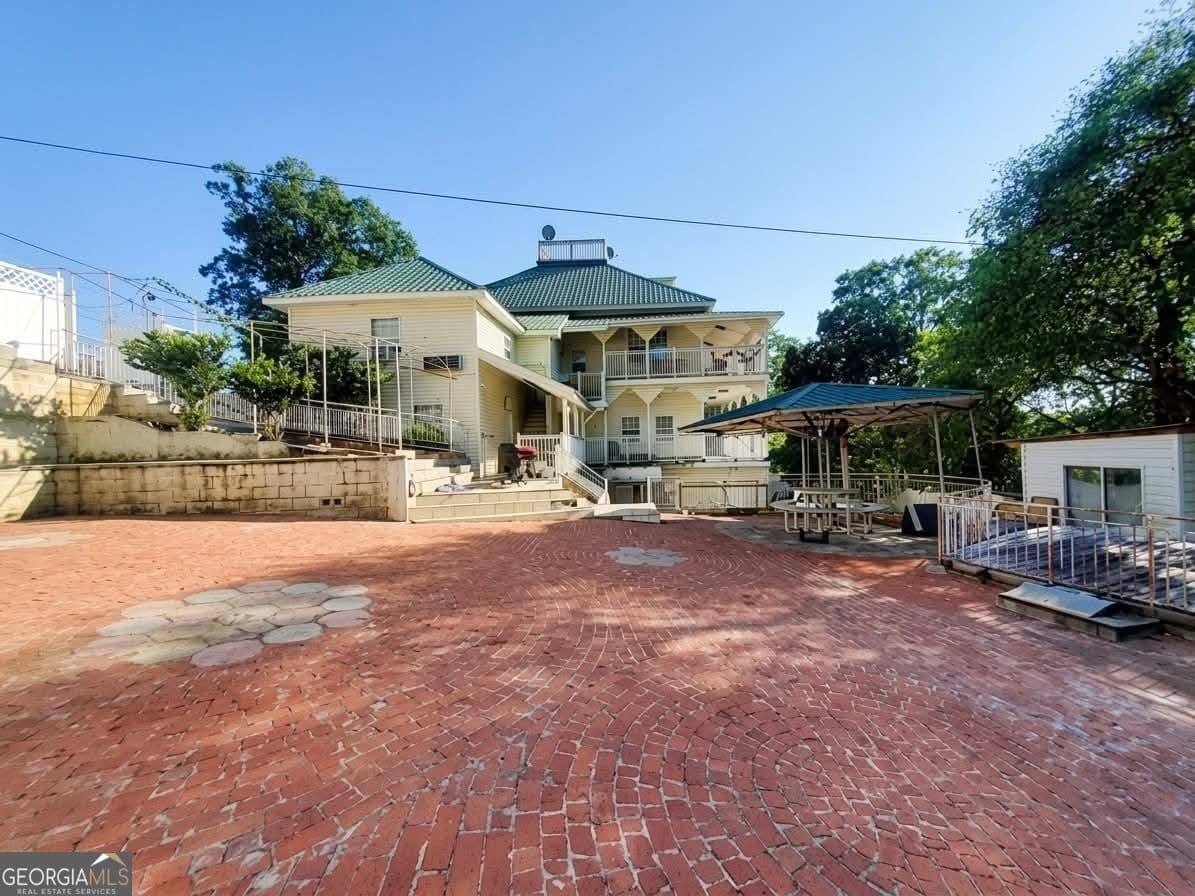 7 bedroom, 10.5 bathroom, 6,184 sq ft single family residence for sale at 209 E Hagen Street 4, Dalton, GA 30721 — photo 3