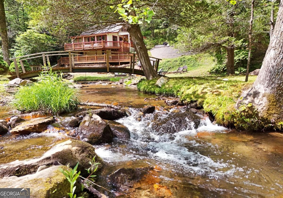 4 bedroom, 2.5 bathroom, 2,016 sq ft cabin,single family residence for sale at 13111 Big Creek Road, Cherry Log, GA 30522 — photo 2