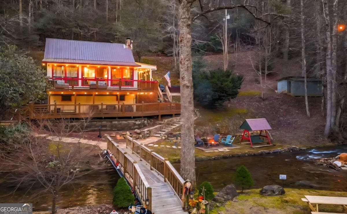 4 bedroom, 2.5 bathroom, 2,016 sq ft cabin,single family residence for sale at 13111 Big Creek Road, Cherry Log, GA 30522 — photo 7