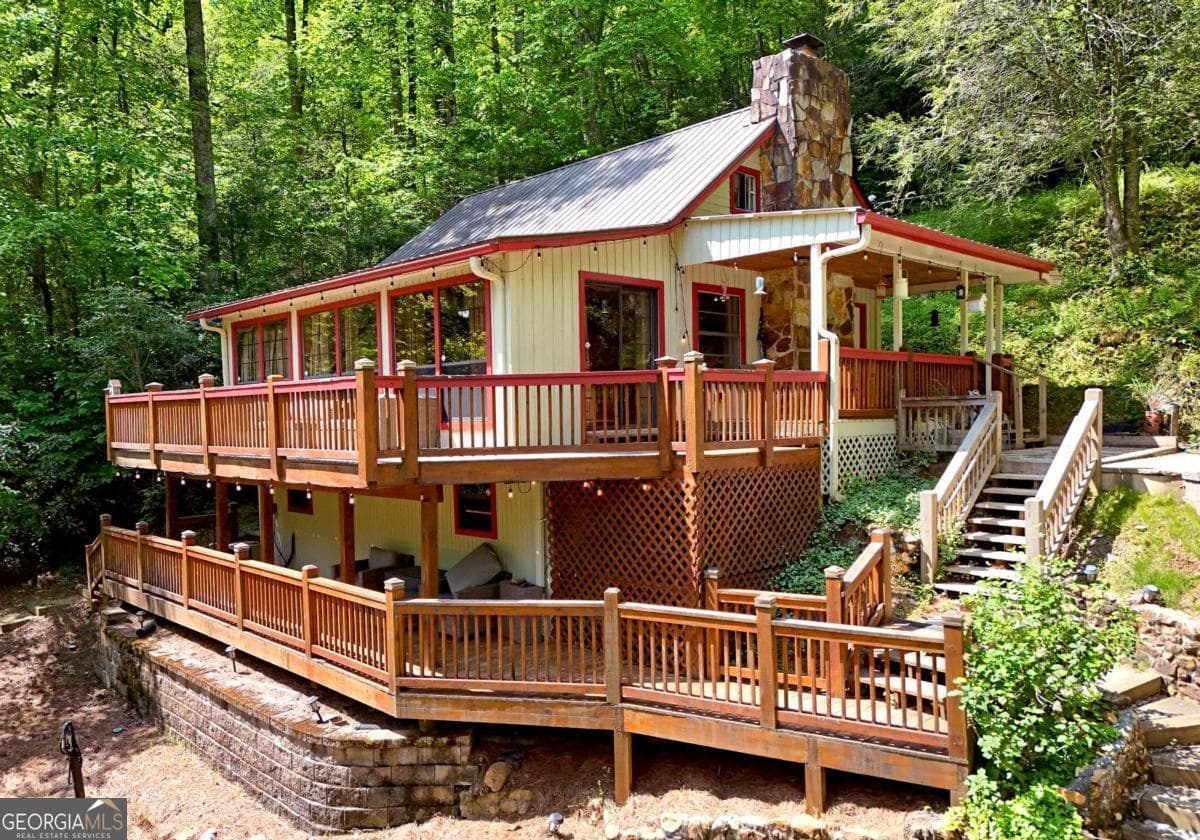 4 bedroom, 2.5 bathroom, 2,016 sq ft cabin,single family residence for sale at 13111 Big Creek Road, Cherry Log, GA 30522 — photo 5