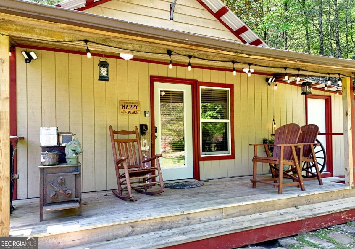 4 bedroom, 2.5 bathroom, 2,016 sq ft cabin,single family residence for sale at 13111 Big Creek Road, Cherry Log, GA 30522 — photo 8