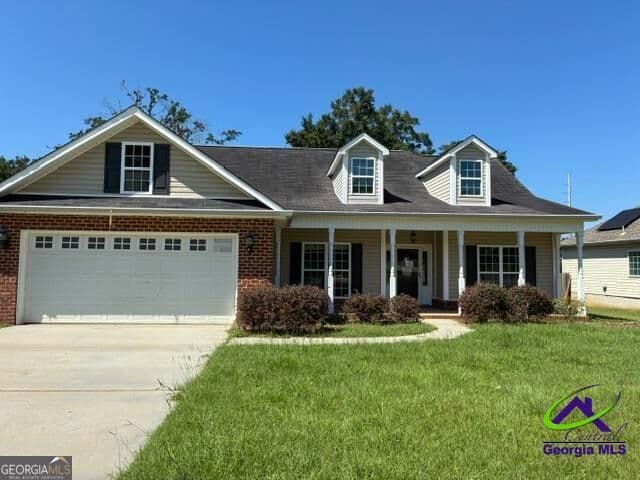 4 bedroom, 2 bathroom, 1,751 sq ft single family residence for sale at 201 Boulder Creek Road, Kathleen, GA 31047 — photo 1 of 16