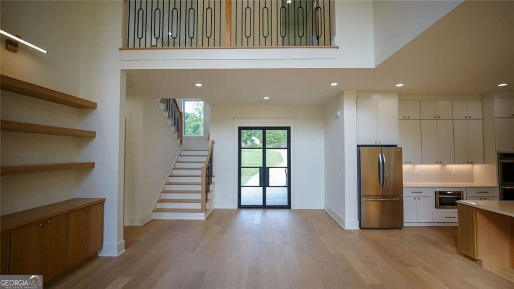 5 bedroom, 4.5 bathroom, 5,444 sq ft single family residence for sale at 6214 Blackjack Road, Flowery Branch, GA 30542 — photo 6