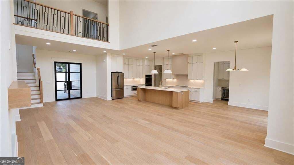 5 bedroom, 4.5 bathroom, 5,444 sq ft single family residence for sale at 6214 Blackjack Road, Flowery Branch, GA 30542 — photo 7