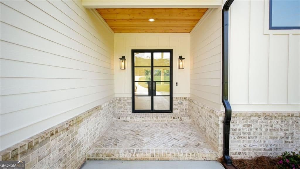 5 bedroom, 4.5 bathroom, 5,444 sq ft single family residence for sale at 6214 Blackjack Road, Flowery Branch, GA 30542 — photo 5