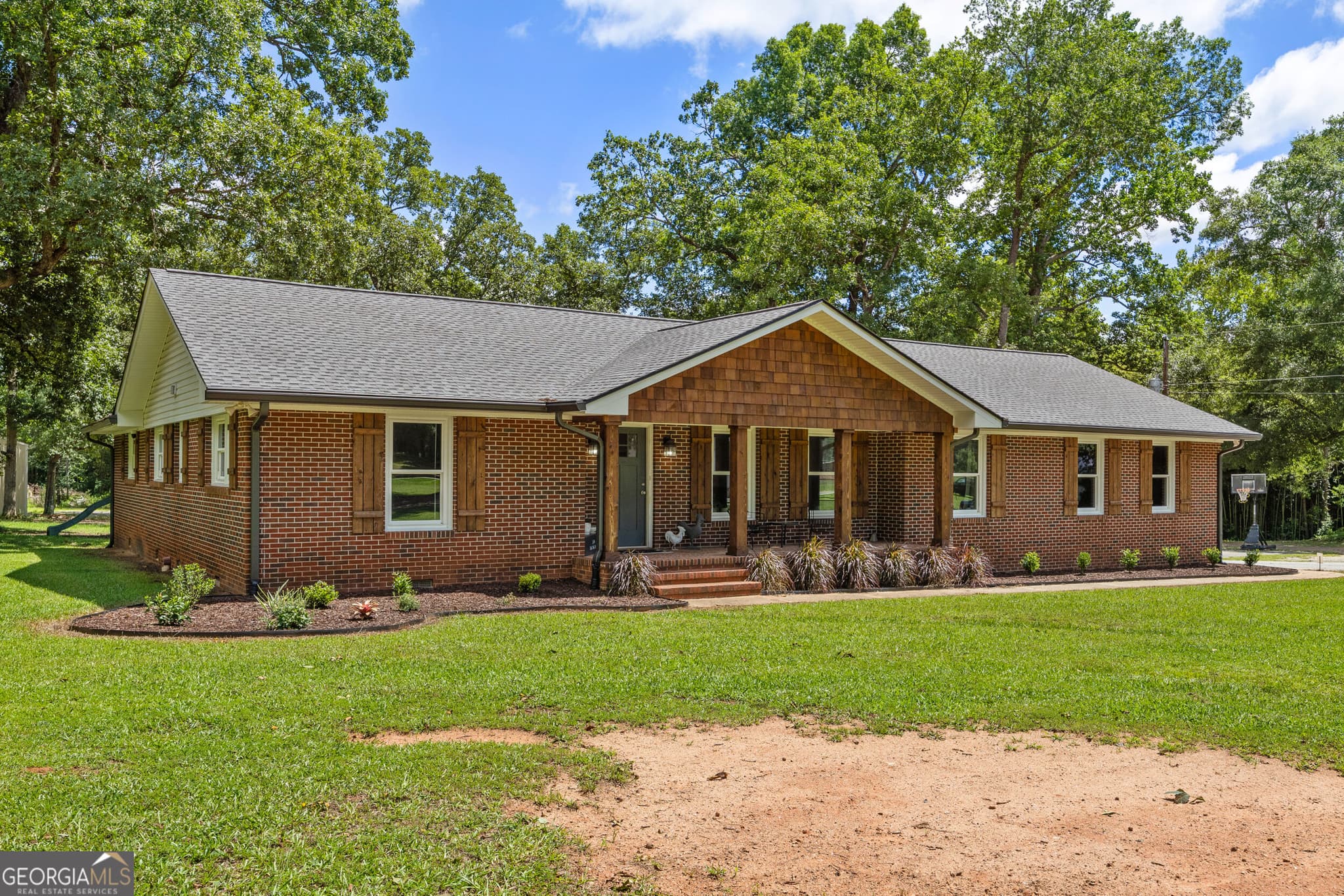 4 bedroom, 3 bathroom, 3,047 sq ft single family residence for sale at 104 E Oak Street, Luthersville, GA 30251 — photo 3