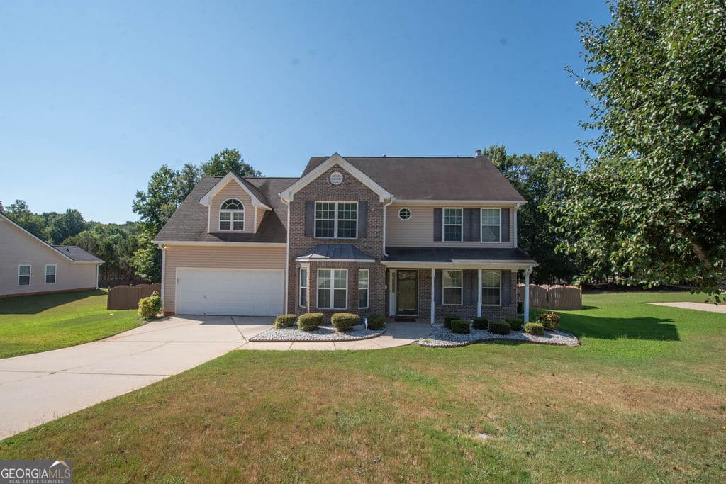 4 bedroom, 2.5 bathroom, 2,663 sq ft single family residence for sale at 136 Peachtree Glenn Drive, Ellenwood, GA 30294 — photo 2
