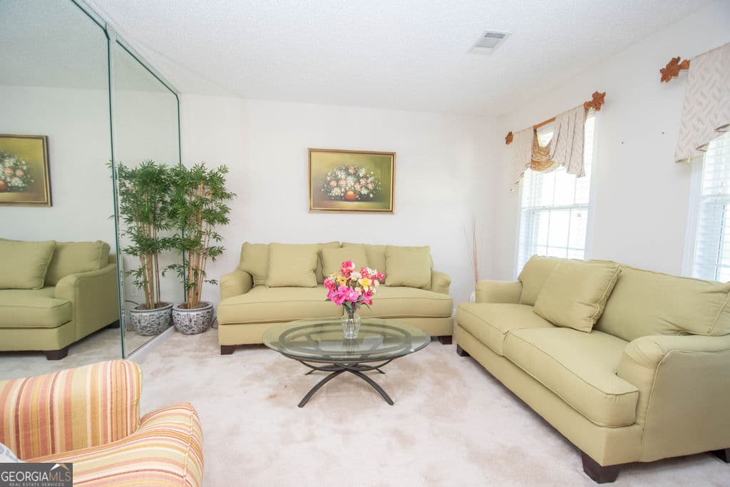 4 bedroom, 2.5 bathroom, 2,663 sq ft single family residence for sale at 136 Peachtree Glenn Drive, Ellenwood, GA 30294 — photo 7