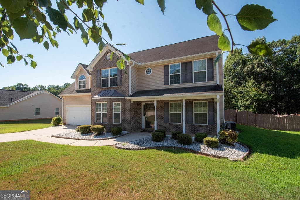 4 bedroom, 2.5 bathroom, 2,663 sq ft single family residence for sale at 136 Peachtree Glenn Drive, Ellenwood, GA 30294 — photo 4
