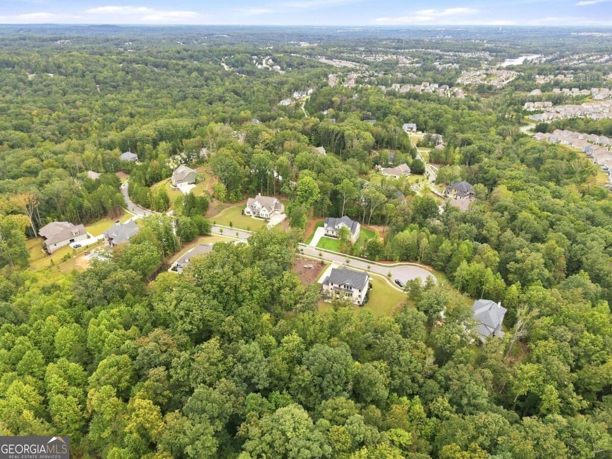 4 bedroom, 3.5 bathroom, 3,029 sq ft single family residence for sale at 6793 Winding Canyon Road, Flowery Branch, GA 30542 — photo 7