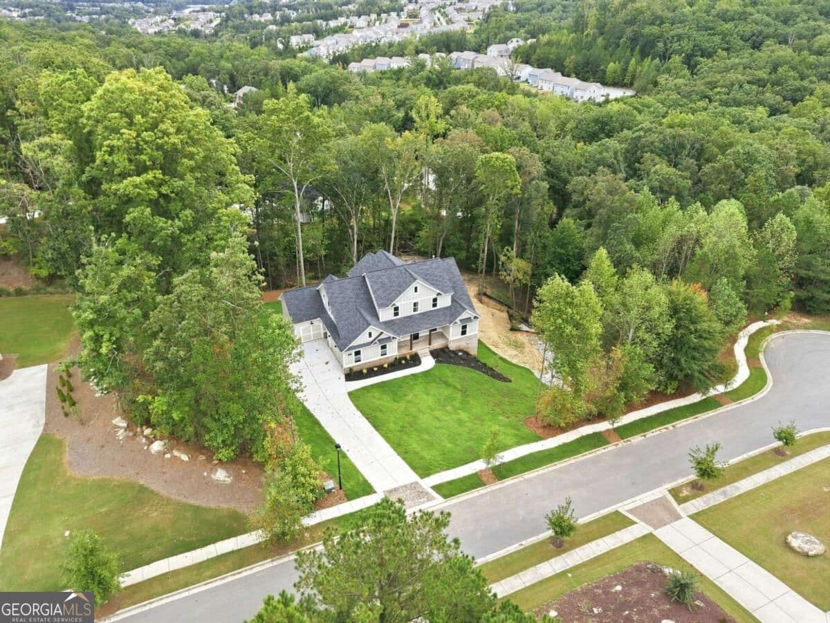 4 bedroom, 3.5 bathroom, 3,029 sq ft single family residence for sale at 6793 Winding Canyon Road, Flowery Branch, GA 30542 — photo 9