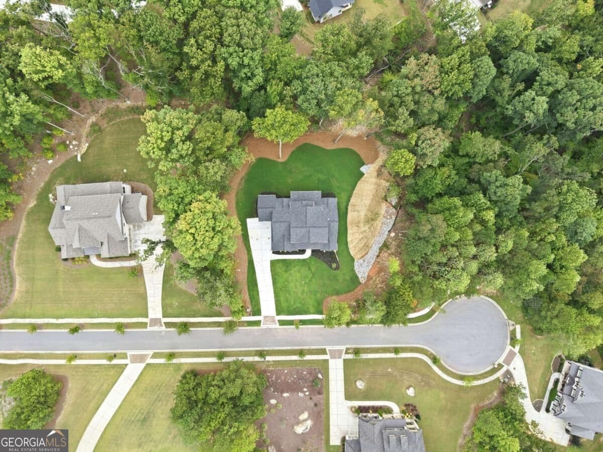 4 bedroom, 3.5 bathroom, 3,029 sq ft single family residence for sale at 6793 Winding Canyon Road, Flowery Branch, GA 30542 — photo 8